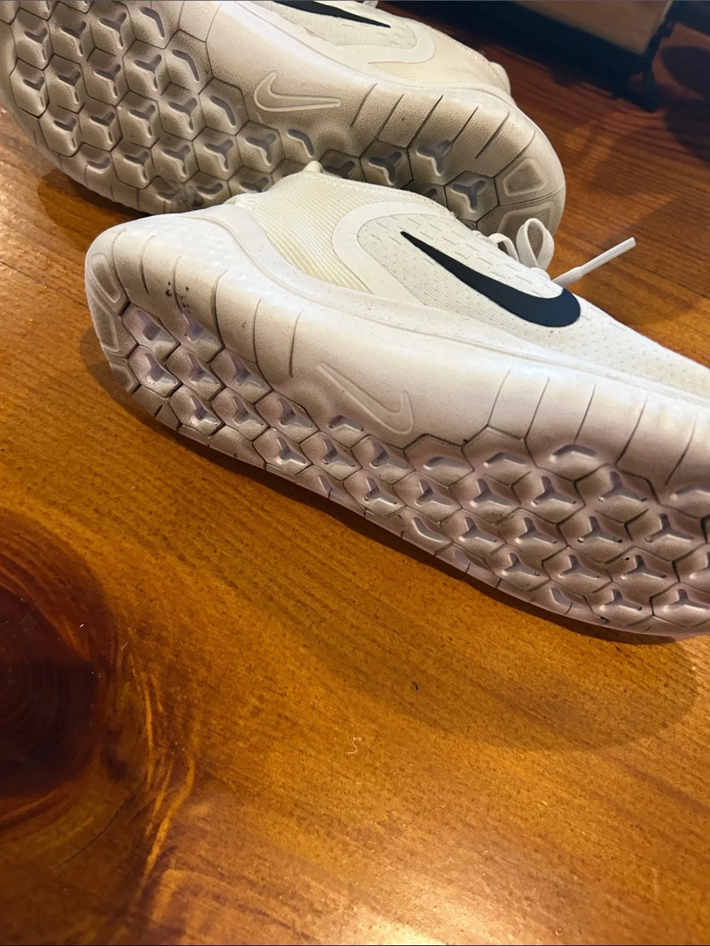 Nike Women’s White Athletic Running Shoes with Black Swoosh